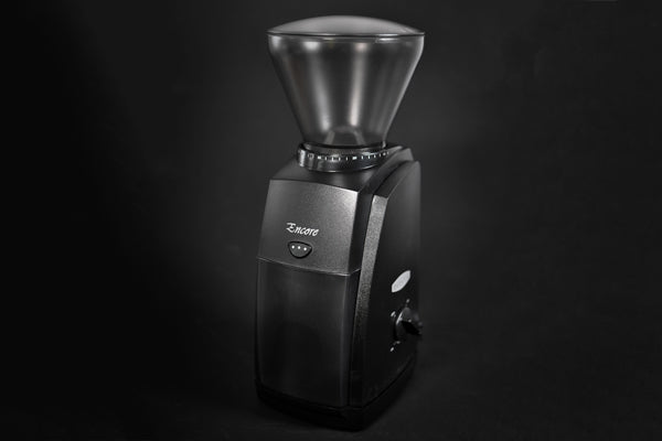 a photo of the Baratza Encore burr grinder against a dark background