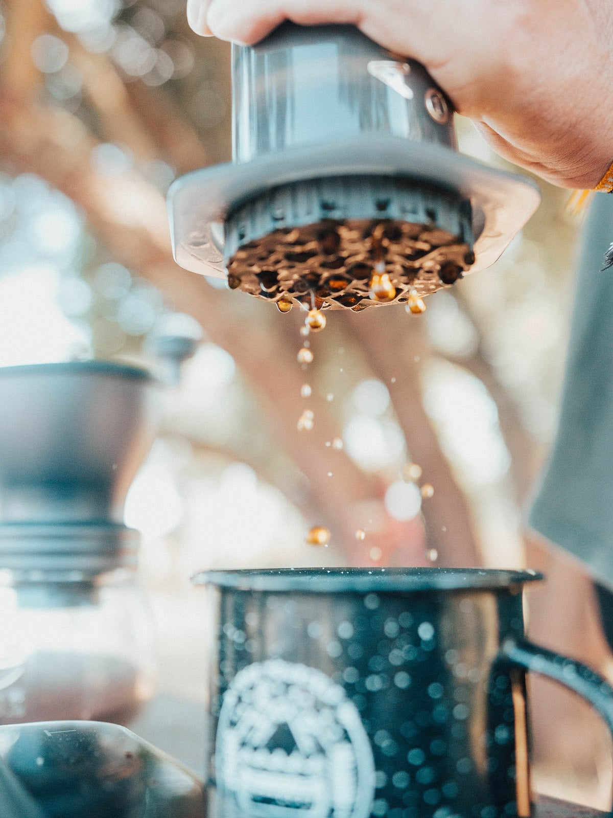 Pressing coffee through AeroPress