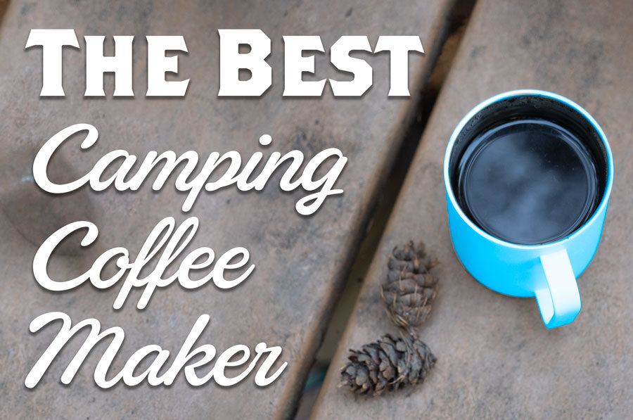 A mug of coffee sits on a picnic table and the text The Best Camping Coffee Maker