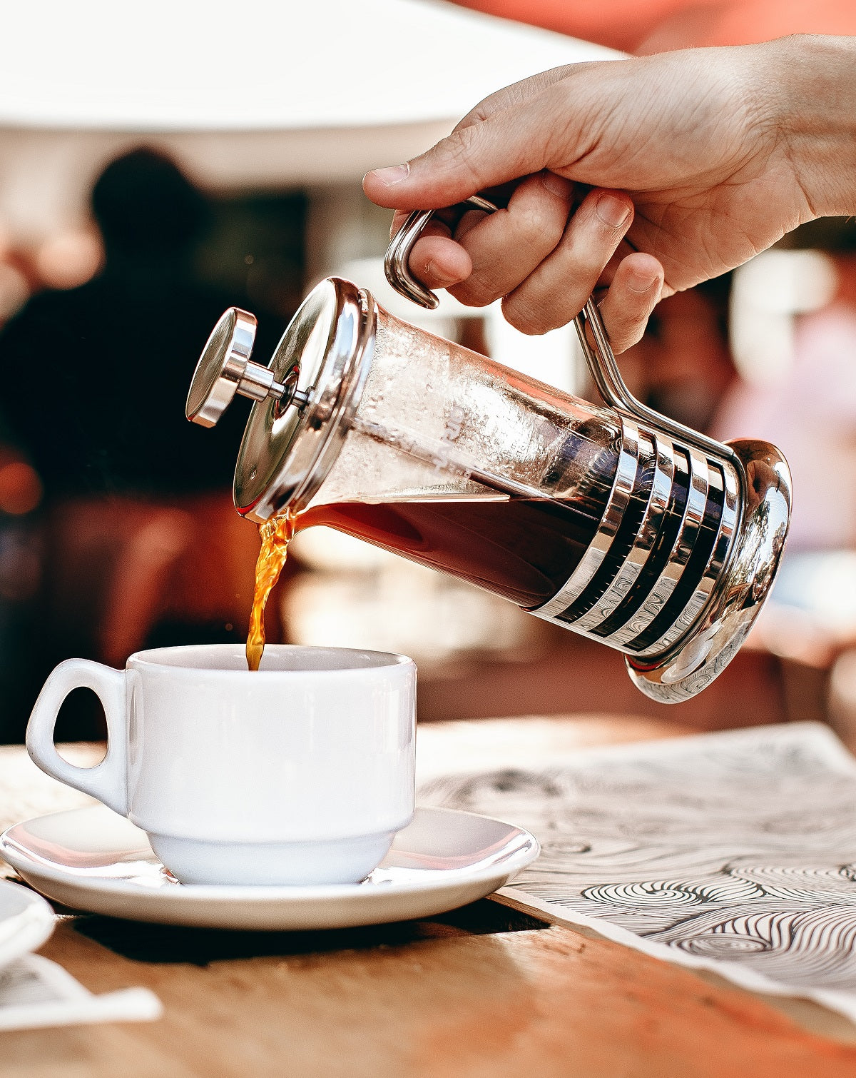 pouring a cup of coffee from FrenchPress