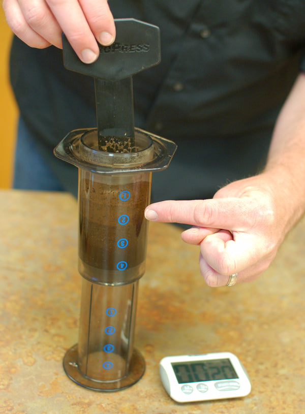 Stiring the bloom of the coffee in an upside AeroPress