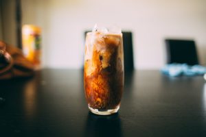 a glass full of iced toddy and milk