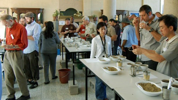 conference attendees cupping coffees