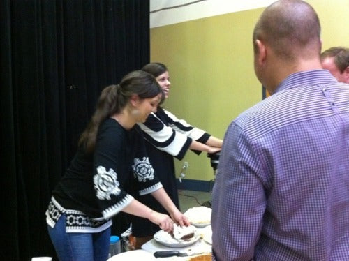 Pie Shop staff dealing out slices to attendees