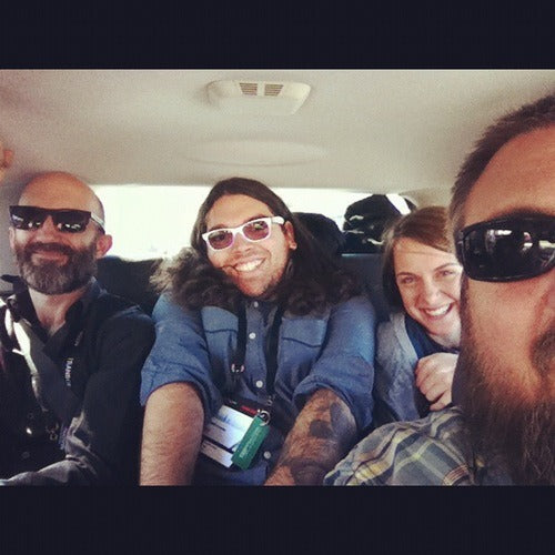 the Batdorf crew crammed into the backseat of a compact car